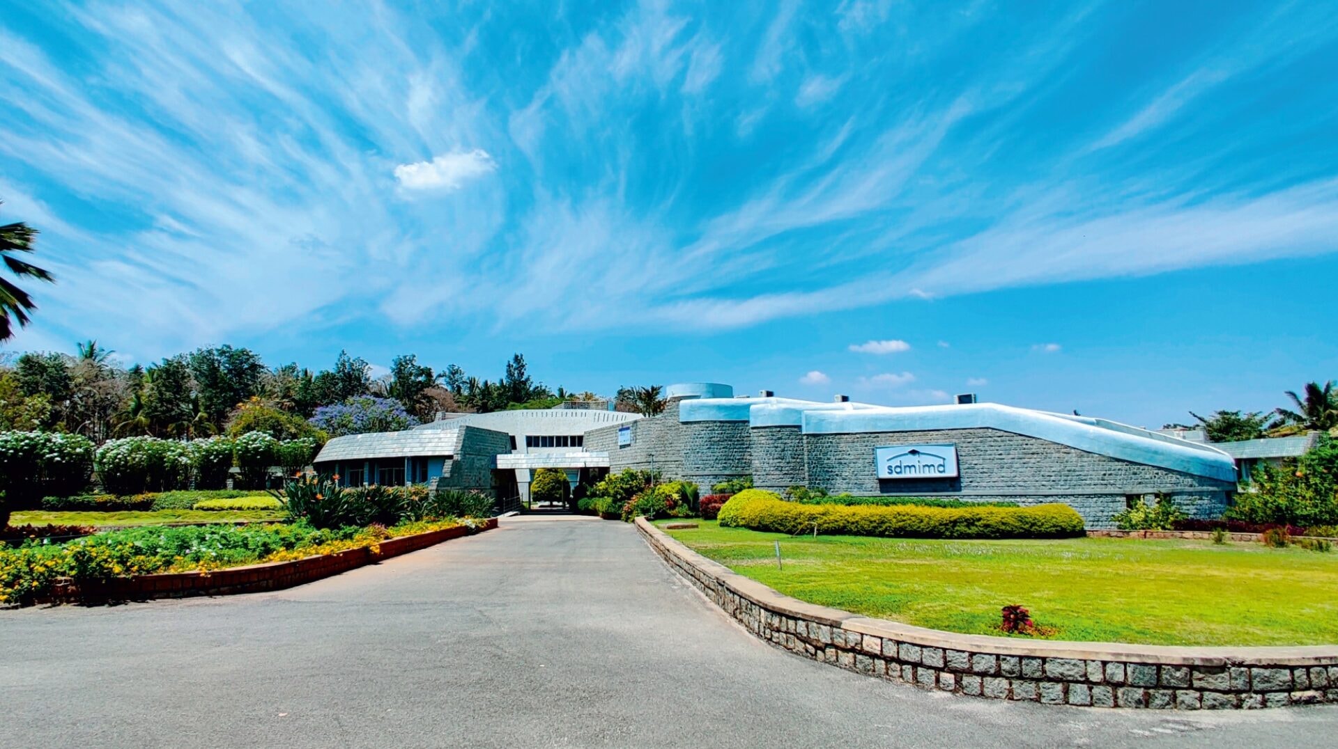 SDMIMD campus building at the foot of Chamundi Hills